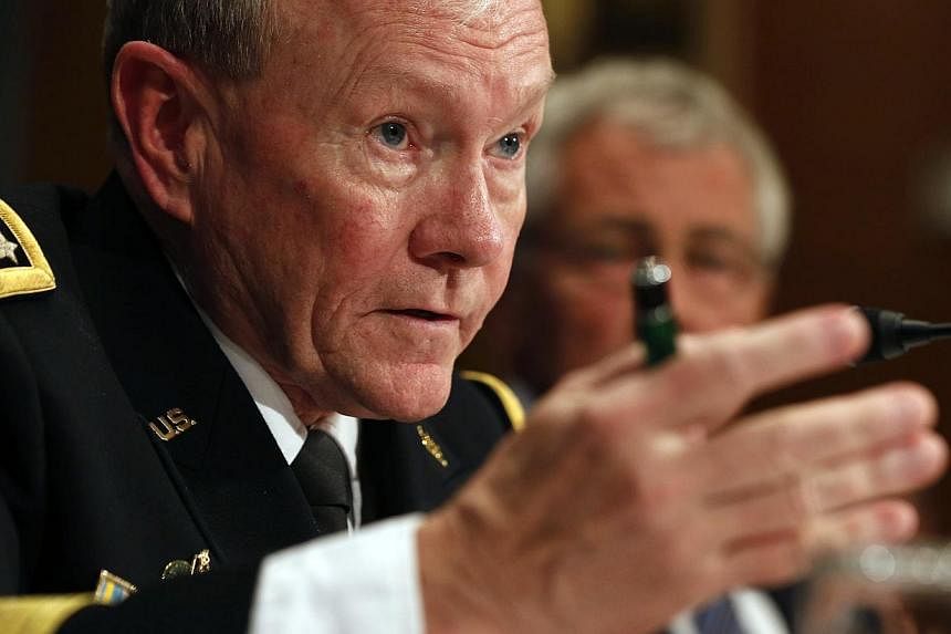 Chairman of the Joint Chiefs of Staff, General Martin Dempsey, speaks during a committee meeting on Capitol Hill in Washington on June 18, 2014. He believes Islamic State extremists will "soon" pose a threat to America and Europe and that an internat