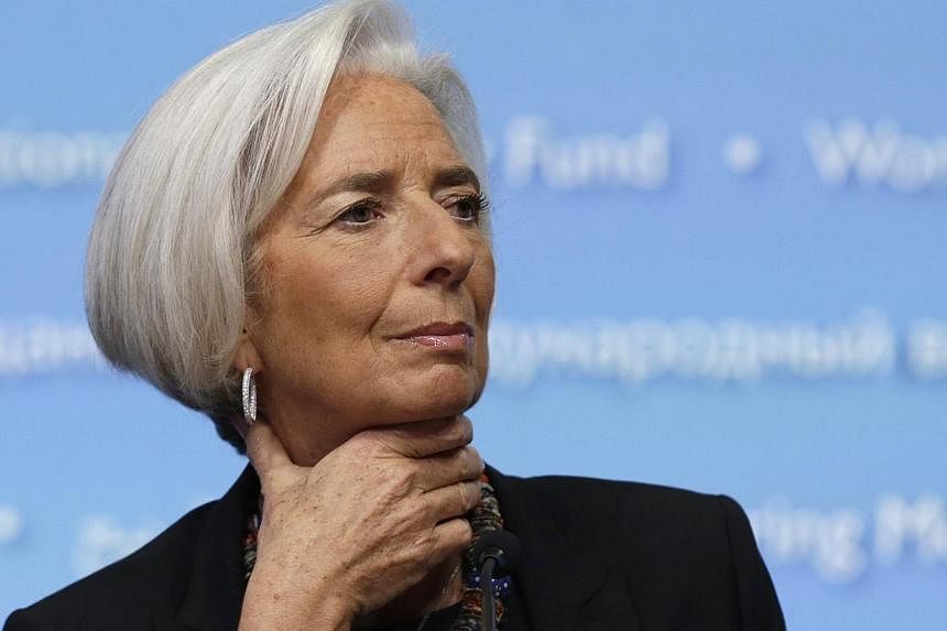 IMF chief Christine Lagarde, one of the world's most powerful women, announced Wednesday she had been charged with "negligence" over a multi-million-euro graft case relating to her time as French finance minister. -- PHOTO: REUTERS