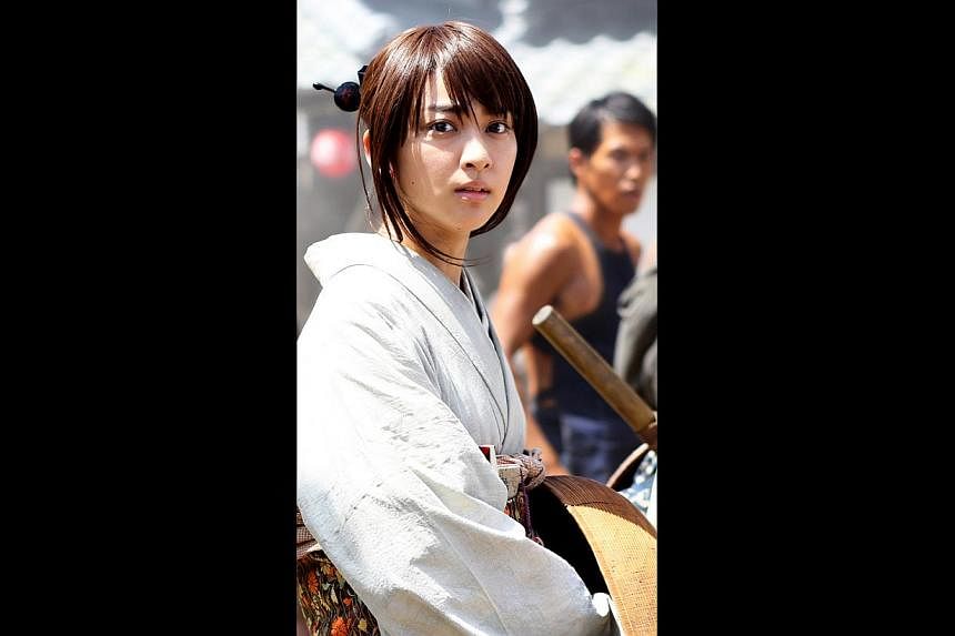 Emi Takei (above) plays Rurouni Kenshin’s love interest. -- PHOTO: WARNER BROS