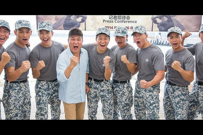 Director Jack Neo (in blue shirt) will direct the third instalment of Ah Boys To Men with a cast of old and new faces, such as Wesley Wong (second from left). -- PHOTO: GOLDEN VILLAGE PICTURES