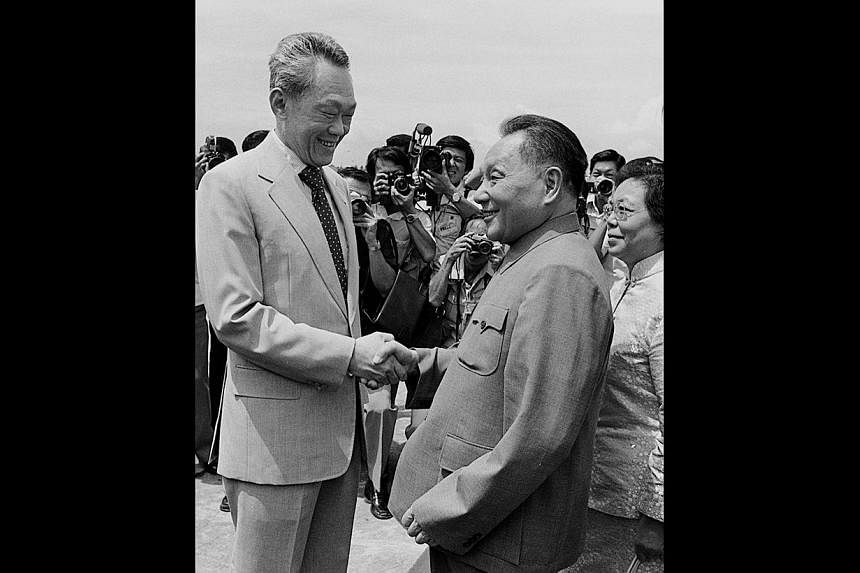 (Far left) A scene aired on Monday night from the serial showing actors portraying then Singapore Prime Minister Lee Kuan Yew and Chinese leader Deng Xiaoping. (Left) The actual meeting between the two leaders. Deng was in Singapore for a three-day o