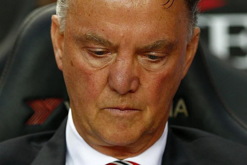 Manchester United manager Louis van Gaal reacts in the League Cup game against Milton Keynes Dons at Stadium MK in Milton Keynes, north of London on Aug 26, 2014. -- PHOTO: REUTERS