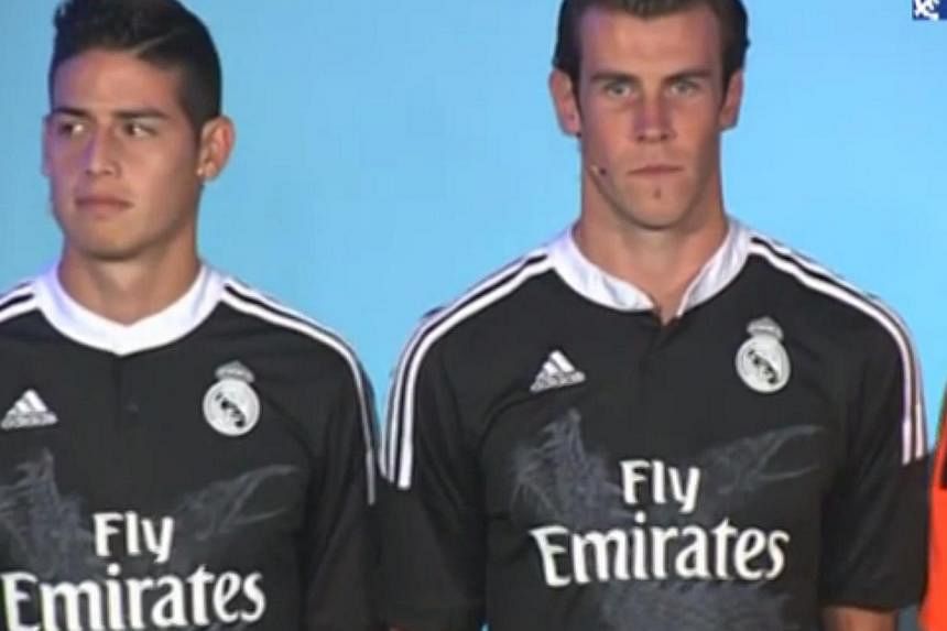 James Rodriguez (left) and Gareth Bale don't look too pleased. -- PHOTO: YOUTUBE PAGE OF REAL MADRID