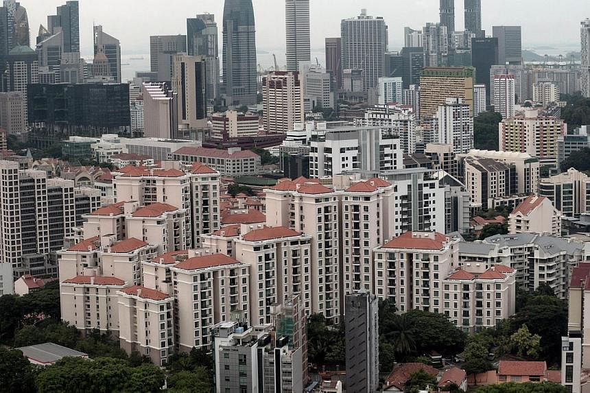 Increased optimism about the property sector has sent investor sentiment here to an 18-month high in the second quarter, according to a new survey. -- PHOTO: AFP