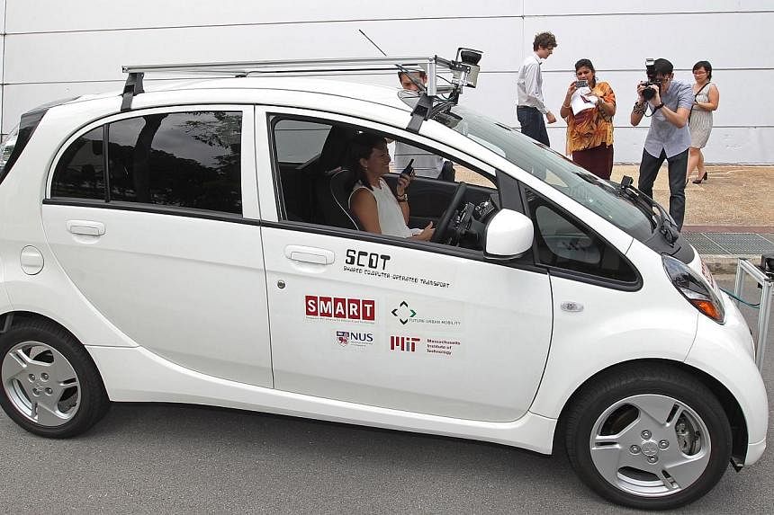 The Shared Computer Operated Transport - or Scot - car that is being test- driven at the National University of Singapore campus since January. The driverless car uses laser sensors to detect and avoid obstacles.