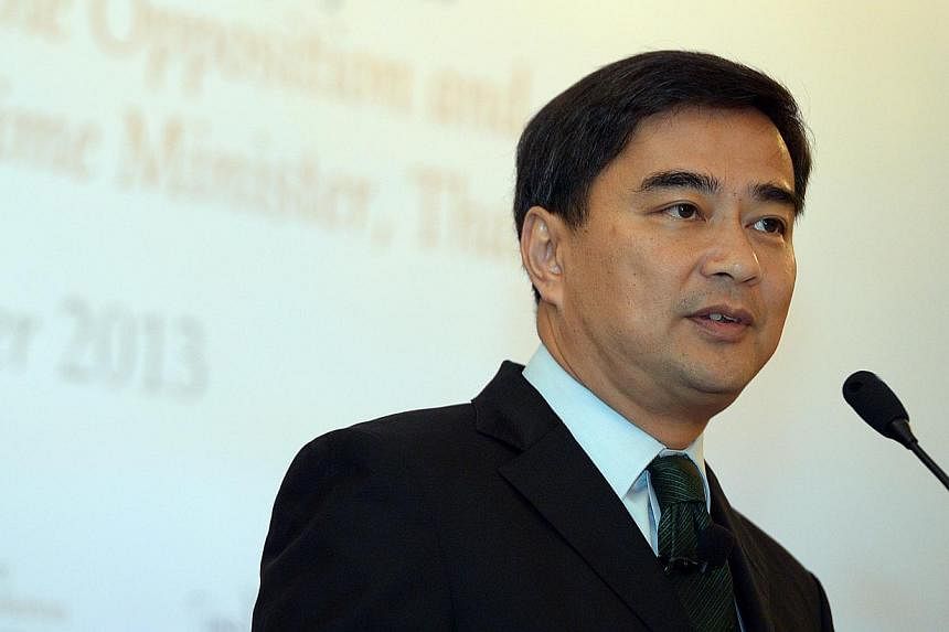 A Thai court on Thursday dismissed charges of murder and abuse of power against former prime minister Abhisit Vejjajiva (above) and his then deputy Suthep Thaugsuban over a deadly crackdown on opposition protests in 2010. -- PHOTO: ST FILE