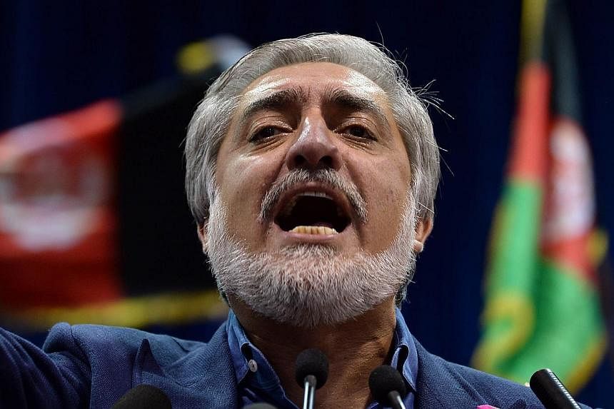 Afghan presidential candidate Abdullah Abdullah will reject the results of a UN-supervised audit of the election, his spokesman said on Wednesday, tipping the country deeper into crisis just a week before the scheduled inauguration. -- PHOTO: AFP&nbs