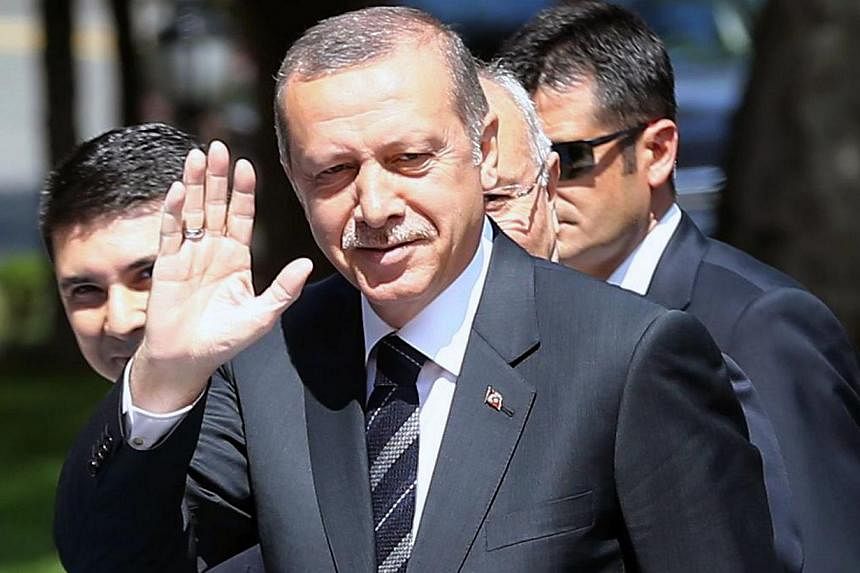 Turkey's outgoing Prime Minister Recep Tayyip Erdogan is to be sworn in as president on Thursday to extend his more than decade-long domination of the country. -- PHOTO: AFP