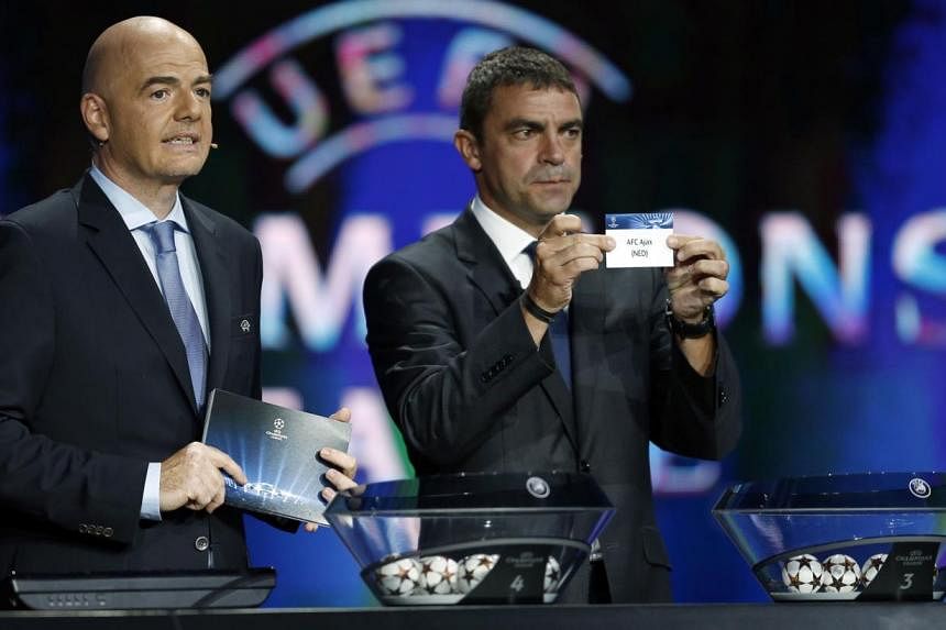 Champions Real Madrid will play five-time former winners Liverpool, while fellow Spanish giants Barcelona plucked big-spending Paris Saint-Germain, as the Champions League group stage draw was made in Monaco on Thursday. -- PHOTO: AFP