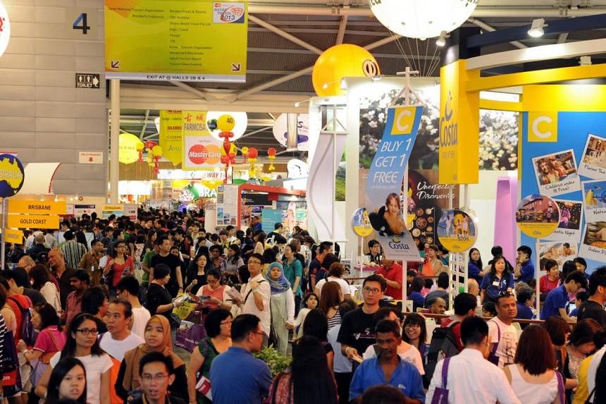 A mega travel fair organised by the National Association of Travel Agents Singapore (Natas) opened at the Singapore Expo on Friday.&nbsp;-- FILE PHOTO : NATAS