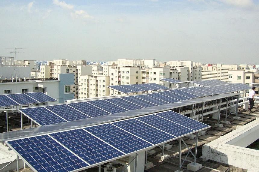 Solar panels atop an HDB block. The HDB will call a tender next year for rooftop solar panel technology, which will also be supplied to Mindef and MOE. Minister Khaw Boon Wan says the HDB is taking the lead in the tender because it has the greatest e