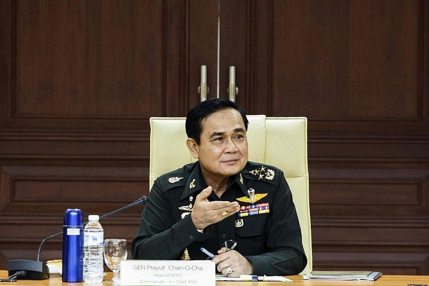 Thailand's newly appointed Prime Minister Prayuth Chan-ocha attending a meeting at the Royal Thai Army headquarters in Bangkok on Aug 27, 2014. -- PHOTO: REUTERS