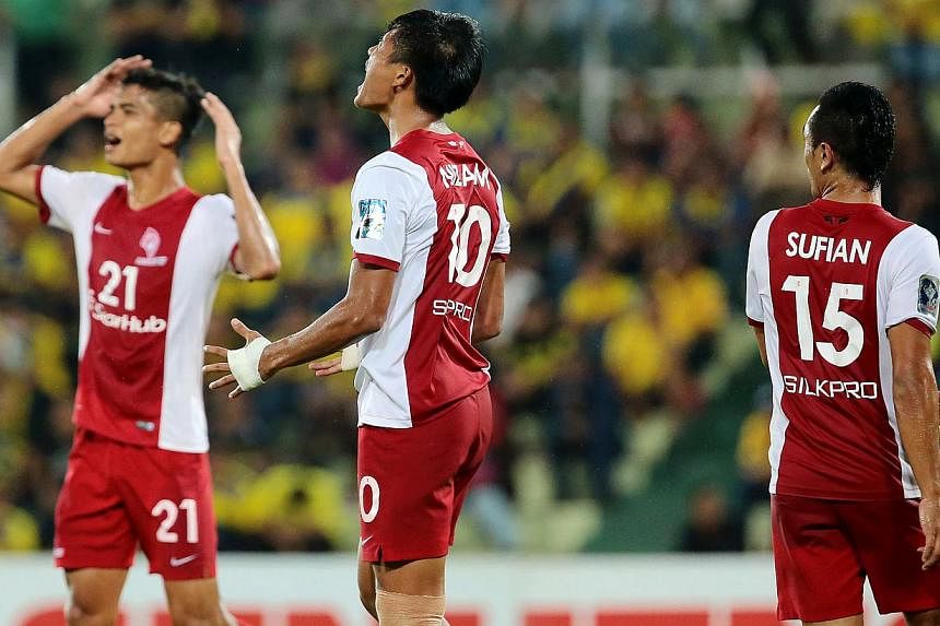 The LionsXII have crashed out of the Malaysia Cup even though they played one of their best games of their season when they came from behind to beat holders Pahang 2-1 on Friday evening. -- PHOTO: THE NEW PAPER