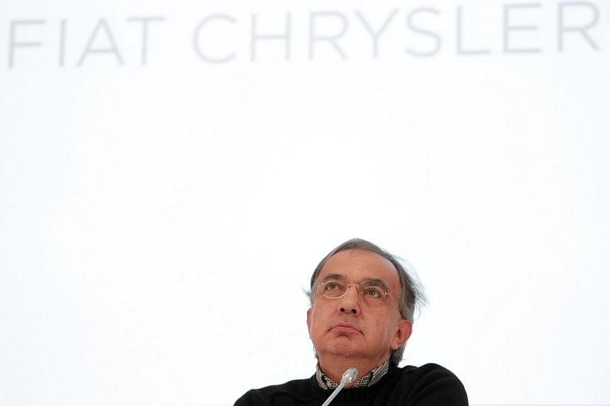 Fiat Chrysler Automobiles (FCA) Group chief executive officer Sergio Marchionne attends a press conference at the end of Fiat's last shareholders general assembly at Lingotto in Turin, on Aug 1, 2014. -- PHOTO: AFP