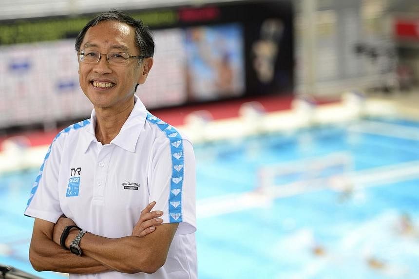 Singapore Swimming Association (SSA) president Lee Kok Choy was coy about the team's medal prospects at next month's Asian Games in South Korea. -- ST PHOTO: DESMOND LIM