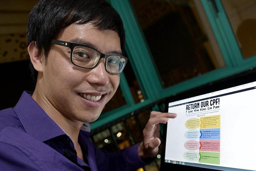This photograph taken on June 9, 2014 shows Roy Ngerng, a blogger and former patient coordinator at the Communicable Disease Centre, showing his website blog on the computer at his home in Singapore. -- PHOTO: AFP
