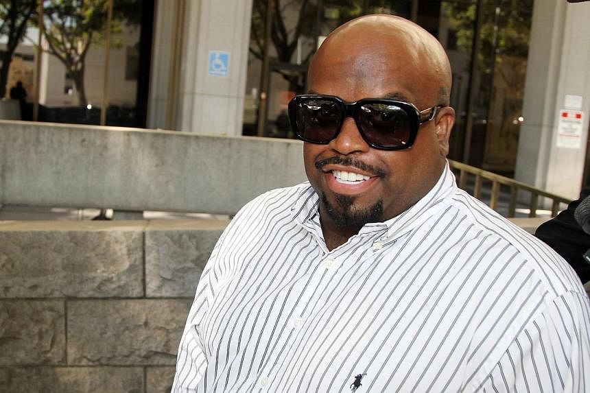 Singer CeeLo Green - whose real name is Thomas DeCarlo Callaway - attends a hearing at the Los Angeles Superior Court House on August 29, 2014 in Los Angeles, California. Green pleaded no contest to a felony charge of furnishing ecstasy and was sente