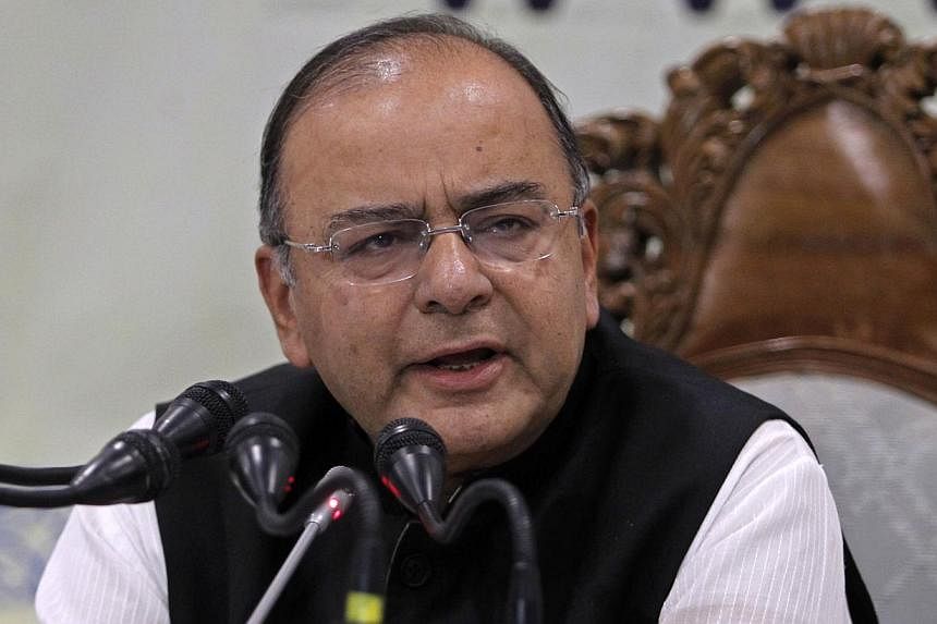 India's Finance and Defence Minister Arun Jaitley speaks during a news conference in Srinagar on June 15, 2014. On Saturday, he described a series of clashes along India's border with Pakistan as extremely serious, provocative and not conducive to ta