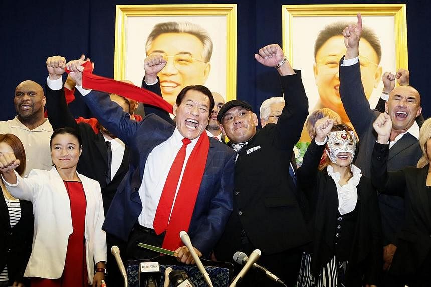 Flamboyant Japanese wrestler-turned-politician Kanji "Antonio" Inoki kicked off his brand of sports diplomacy in North Korea on Saturday ahead of an unusual two-day event featuring martial artists from around the world. -- PHOTO: REUTERS