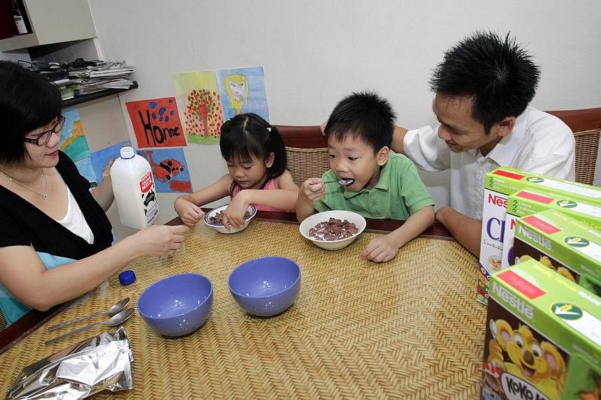 Lavinia (in pink), seven, and Levi, five, having cereal during breakfast with their parents Leonny Atmadja (left), 35, and Wilson Hidajat, 36. Whole grains, having about five times more antioxidants than most greens, are shaping up to be the latest w