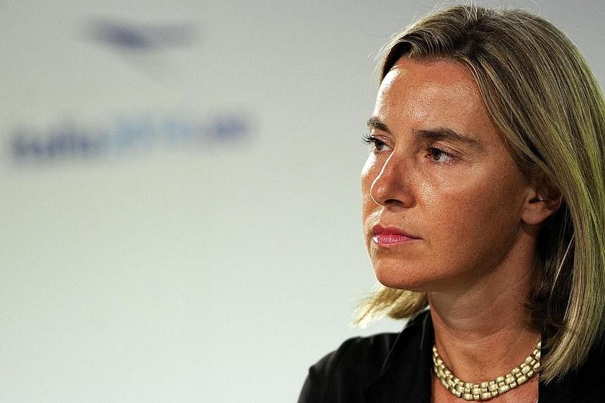 Italy's Foreign Minister Federica Mogherini attends the final press conference during the informal meeting of the EU Foreign Affairs Ministers in Milan on August 30, 2014. Mogherini was chosen to be the bloc's new foreign policy chief. -- PHOTO: AFP