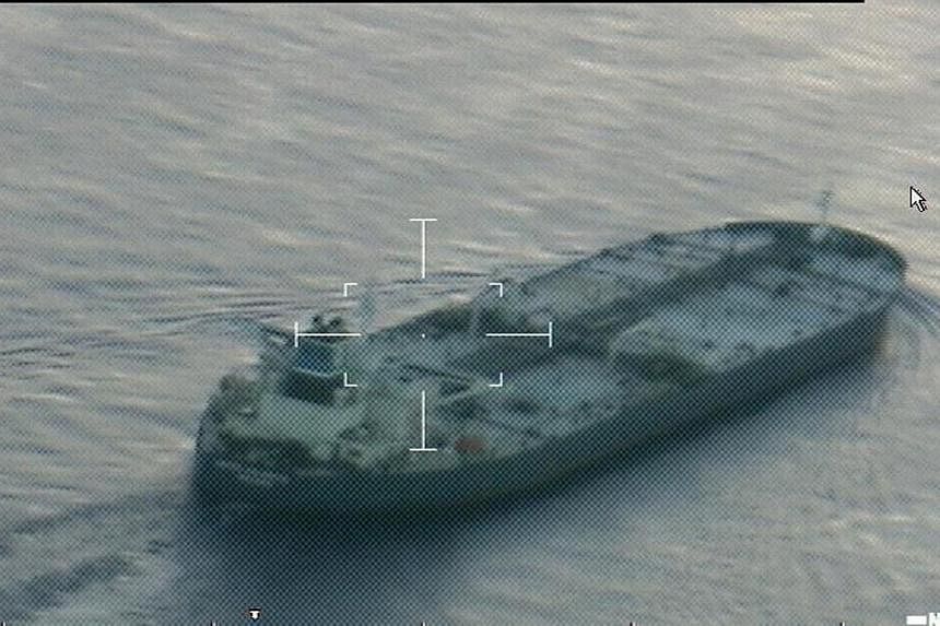 A still image from video taken by a US Coast Guard HC-144 Ocean Sentry aircraft shows the oil tanker United Kalavrvta, which is carrying a cargo of Kurdish crude oil, approaching Galveston, Texas on July 25, 2014.&nbsp;The tanker reappeared on satell