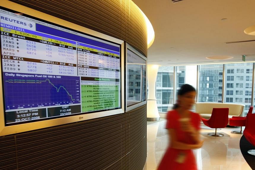 Singapore shares opened lower on Monday, with the benchmark Straits Times Index at 3,326.11 in early trade, down 0.03 per cent, or 0.98 points. -- PHOTO: ST FILE