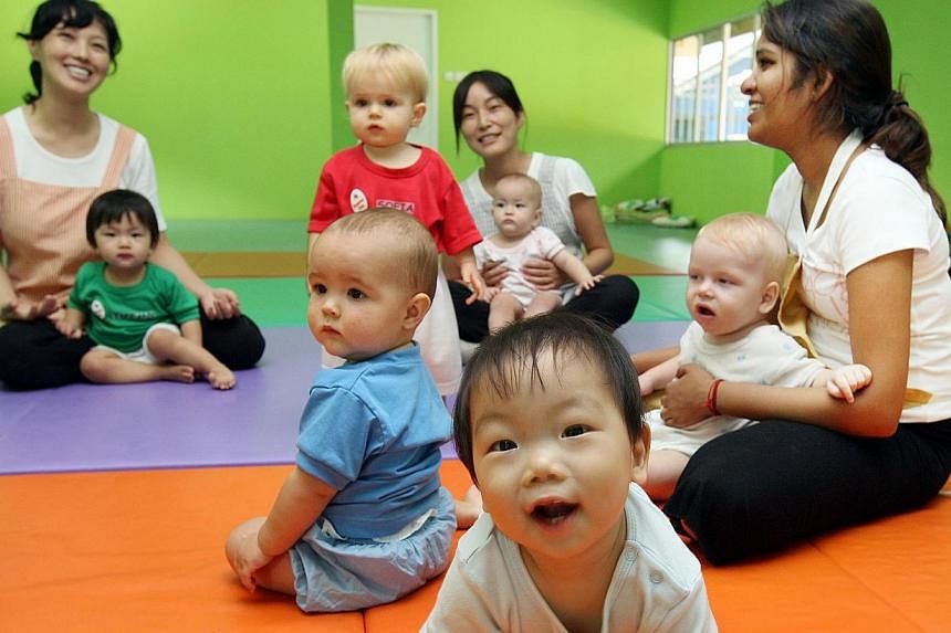 A new study of six-month-old infants has discovered that babies exposed to two languages may have better memory and information processing skills than those only exposed to one. -- PHOTO: ST FILE