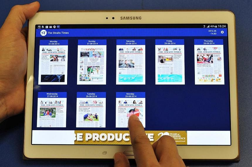 The updated ST Android apps let stories, pictures and videos take centre stage. -- PHOTO: LIM YAOHUI FOR THE STRAITS TIMES