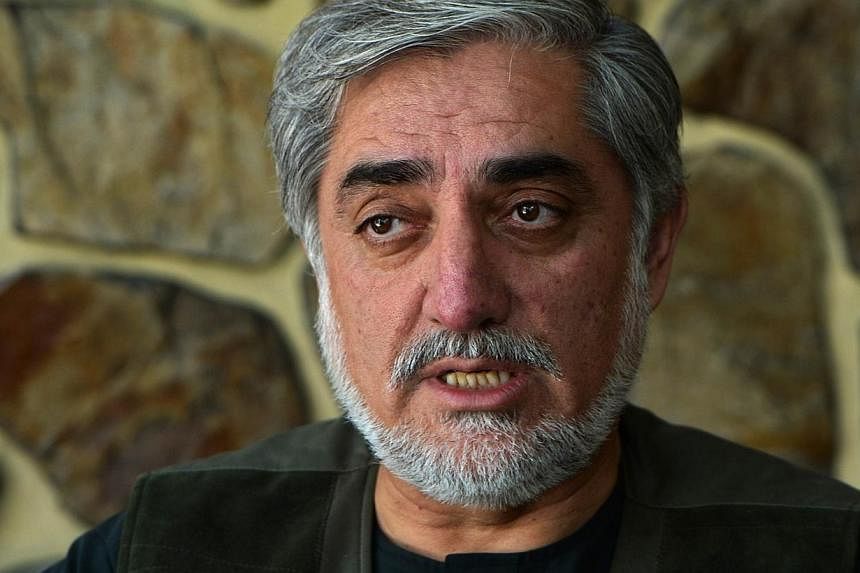 Afghan presidential candidate Abdullah Abdullah talks during an interview with AFP at his residence in Kabul on Aug 9, 2014. -- PHOTO: AFP