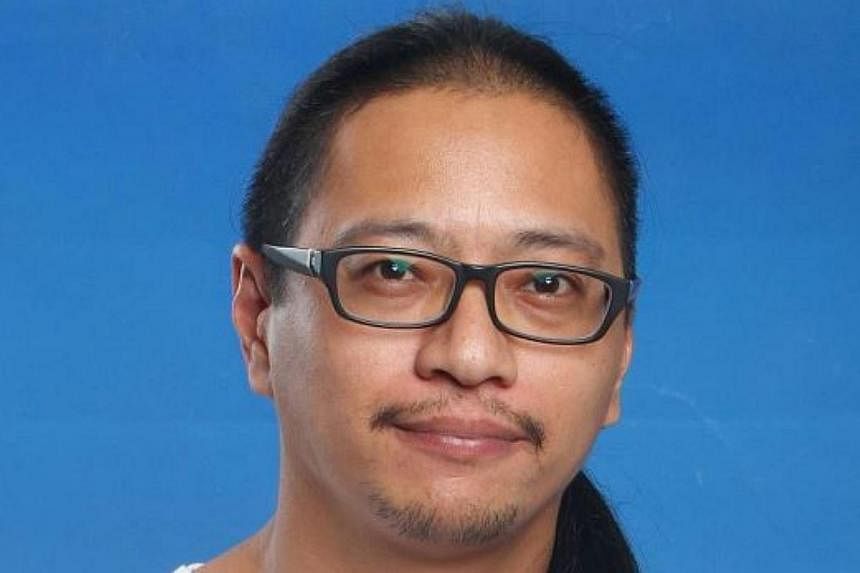 Uni­versiti Malaya law lecturer, Associate Professor Azmi Sharom. Sharom was charged by prosecutors&nbsp;with sedition on Tuesday for an opinion he voiced on a political crisis that occurred five years ago.&nbsp;-- PHOTO: THE STAR/ASIA NEWS NETWORK