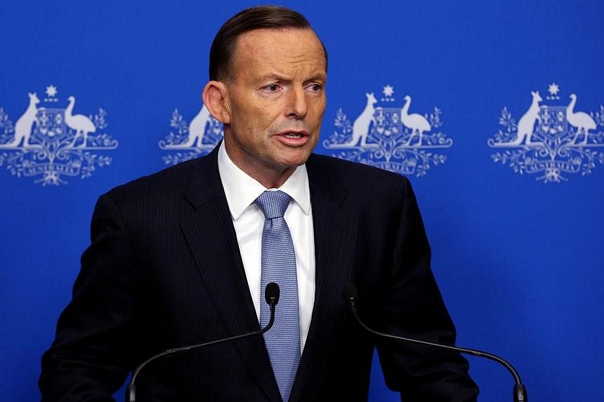 Prime Minister Tony Abbott on Tuesday said "extreme force" was justified in battling Islamic State militants as he played down reports that an Australian plane delivering humanitarian aid in Iraq came under fire. -- PHOTO: AFP