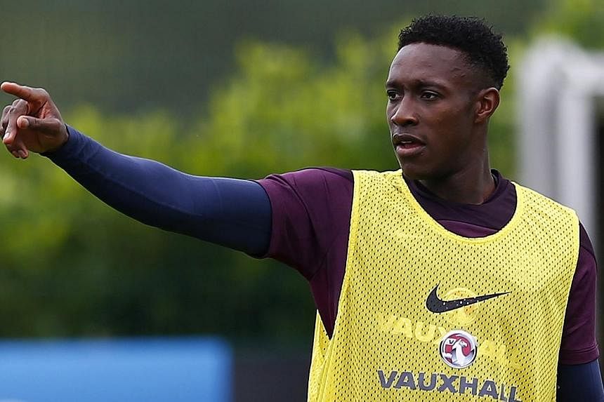 England's Danny Welbeck gestures during a training session at Arsenal's training facility in London Colney, north of London, on Sept 1, 2014.&nbsp;England forward Danny Welbeck risked antagonising supporters of his former club Manchester United on We