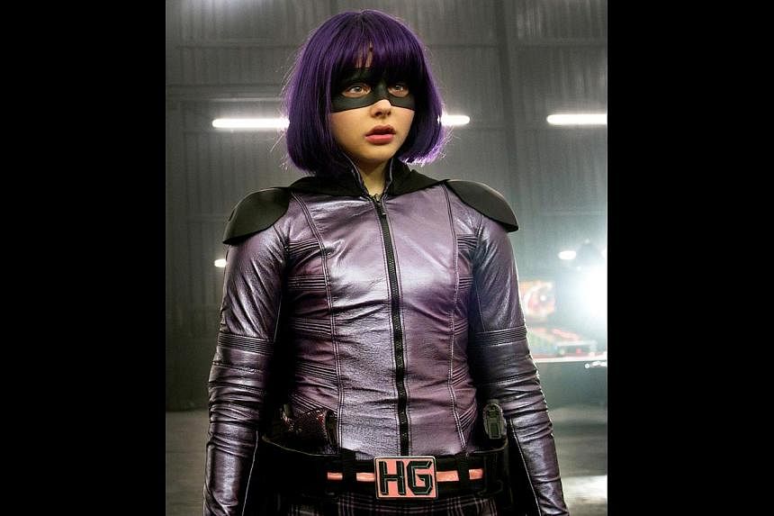 Chloe Grace Moretz, who says this foray into soft-focused romance does not mean she has abandoned her innate preference for stronger roles such as Hit-Girl (above) in Kick-Ass. -- PHOTO: UIP