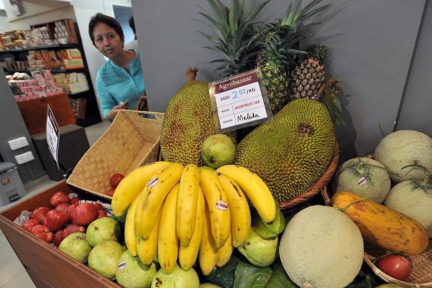 A fruit display at an Agrobazaar Malaysia stall. Located at Sultan Gate off Beach Road, the bazaar stocks authentic Malaysian produce, including fruit and groceries. -- PHOTO: LIM YAOHUI FOR THE STRAITS TIMES