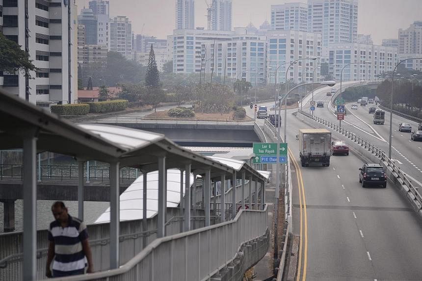 Air quality in Singapore hovered in the higher end of the &nbsp;"moderate" range on Thursday, with the Pollutant Standards Index (PSI) three-hour reading hitting a high of 84 at 10am. -- PHOTO: ST FILE