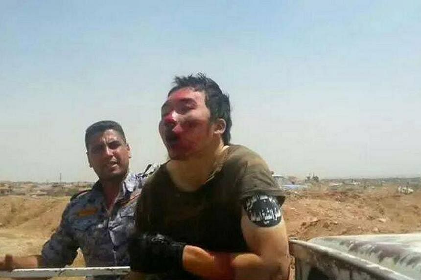 Iraqi Ministry of Defence/Iraq says it has captured an Islamic State militant from China, which would, if proven, make the man the first confirmed Chinese national to be found fighting for the extremist Sunni militant group.&nbsp;-- PHOTO:&nbsp;IRAQI