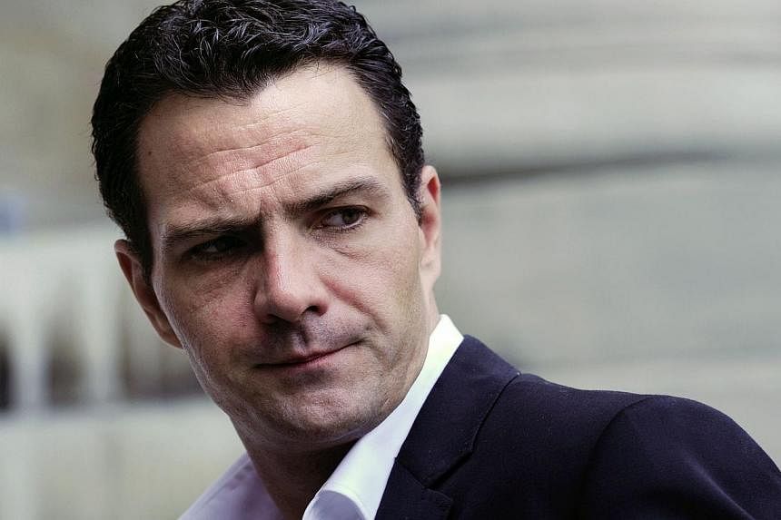 French rogue trader Jerome Kerviel arriving at Paris courthouse to attend his appeal hearing of a 2010 conviction for costing bank Societe Generale billions of euros on June 27, 2012. -- PHOTO: AFP