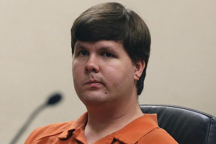 Justin Ross Harris sits in Cobb County Magistrate Court in Marietta, Georgia on July 3, 2014. Harris is being charged with malice murder in the case of his 22-month-old son who he left for seven hours in a car while he was at work June 18, 2014 accor
