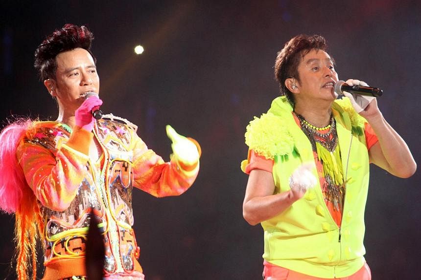 Veteran Hong Kong singers Alan Tam (right) and Hacken Lee will be bringing their 10th anniversary tour to Singapore. &nbsp;-- PHOTO:&nbsp;UNUSUAL ENTERTAINMENT