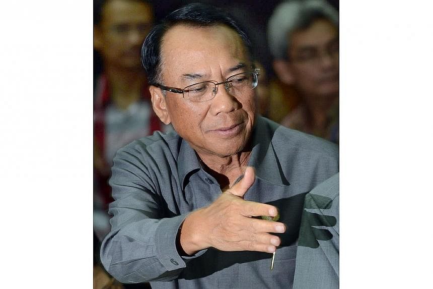 In this file photograph taken on June 21, 2013, Indonesian Energy and Mineral Resources Minister Jero Wacik is seen at a press conference in Jakarta.&nbsp;Indonesia's energy minister stepped down on Friday, a presidential spokesman said, after anti-c