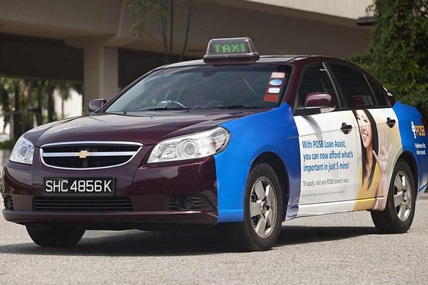 An SMRT Chevrolet Epica taxi. SMRT Road Holdings, a unit of SMRT Corp, has tied up with London-based taxi mobile application developer Hailo Network Holdings to introduce a taxi booking application for passengers and taxi drivers in Singapore. -- PHO