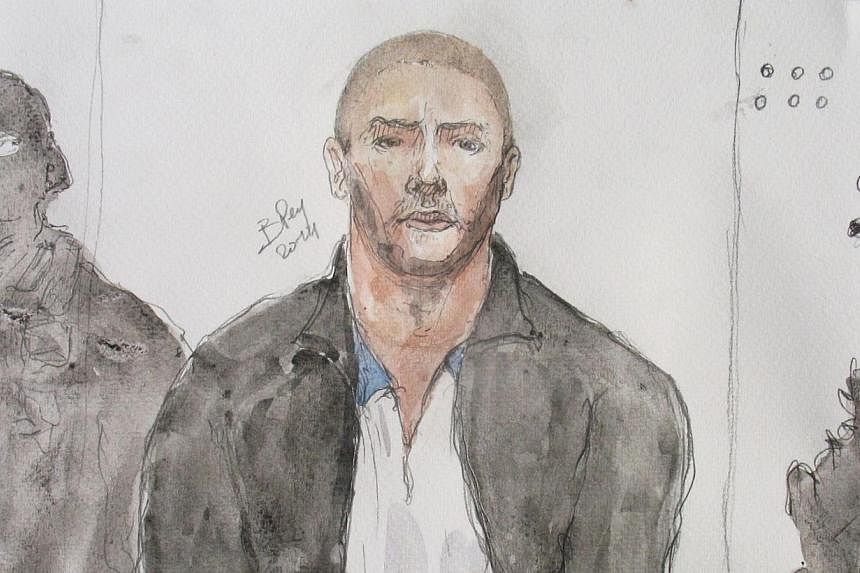 This court drawing made on June 26, 2014, shows Mehdi Nemmouche (centre), the 29-year-old suspected gunman in a quadruple murder at the Brussels Jewish Museum, during a court hearing in Versailles, France.&nbsp;A freed French hostage has said the sus