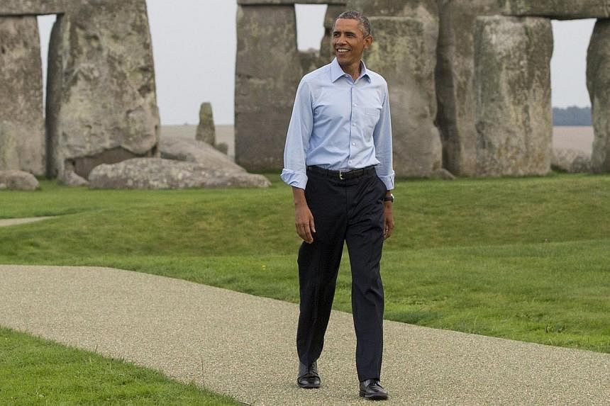 US President Barack Obama tours Stonehenge in Amesbury, Wiltshire, England, on Sept 5, 2014. -- PHOTO: AFP