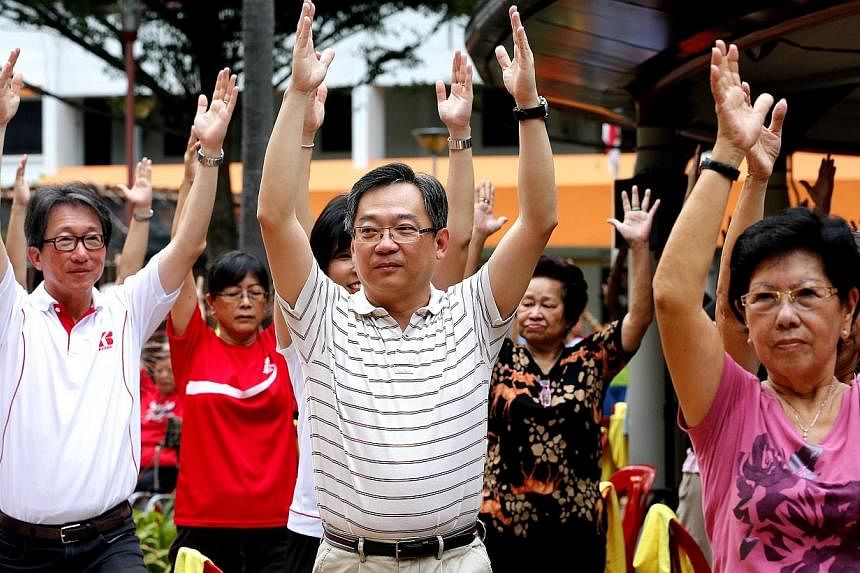 Minister in the Prime Minister's Office&nbsp;Lim Swee Say (left) and Health Minister Gan Kim Yong (centre) joining the yoga exercises and attending an event on the Bedok Community For All Ages Journey, a grassroots programme to address the needs of v