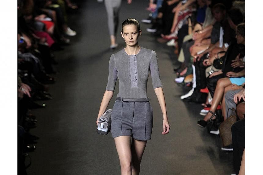 A model presents a creation by Alexander Wang Spring/Summer 2015 collection during New York Fashion Week on Sept 6, 2014 in New York. -- PHOTO: AFP