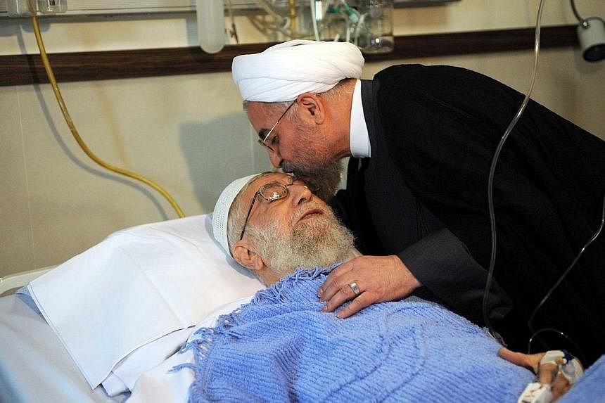 Iranian President Hassan Rouhani visiting&nbsp;Iran's Supreme leader Ayatollah Ali Khamenei after the latter's prostate operation at a hospital in Teheran onMonday, Sept 8, 2014.&nbsp;The Ayatollah successfully underwent prostate surgery, it was anno