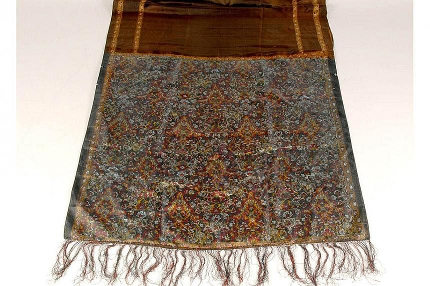 The shawl that was taken from the murder scene of Jack the Ripper's fourth victim Catherine Eddowes on Sept 30, 1888. -- PHOTO: AFP