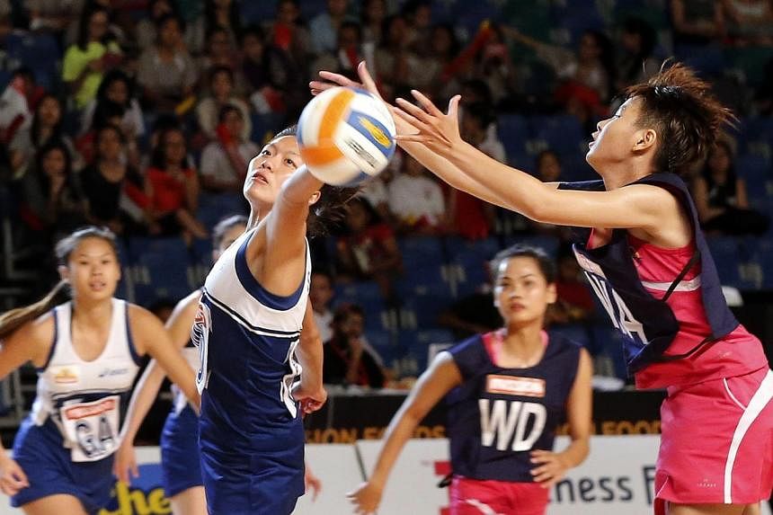 Singapore (in blue) defeated Group A opponents Vietnam 84-8 at the Mission Foods Asian Netball Championships. -- ST PHOTO: CHEW SENG KIM&nbsp;