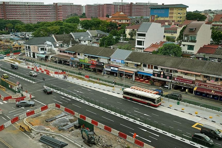 The hoardings that used to block the shopfronts of some businesses in the Upper Bukit Timah area were removed last month after the completion of major construction for the MRT Downtown Line 2. -- ST PHOTO: KUA CHEE SIONG